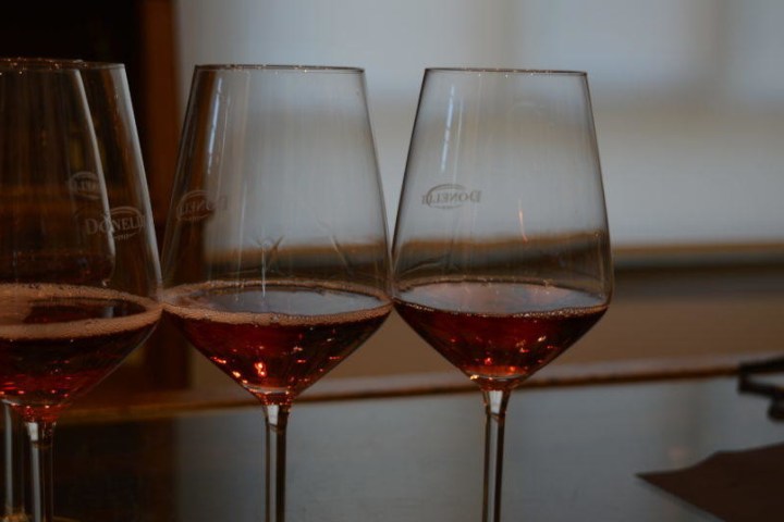 glasses of wine filled with red wine