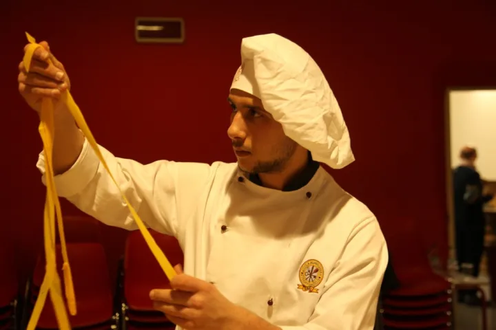 a man holding up his hand