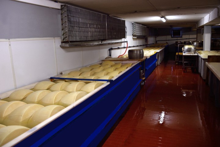 a kitchen with a table in a room