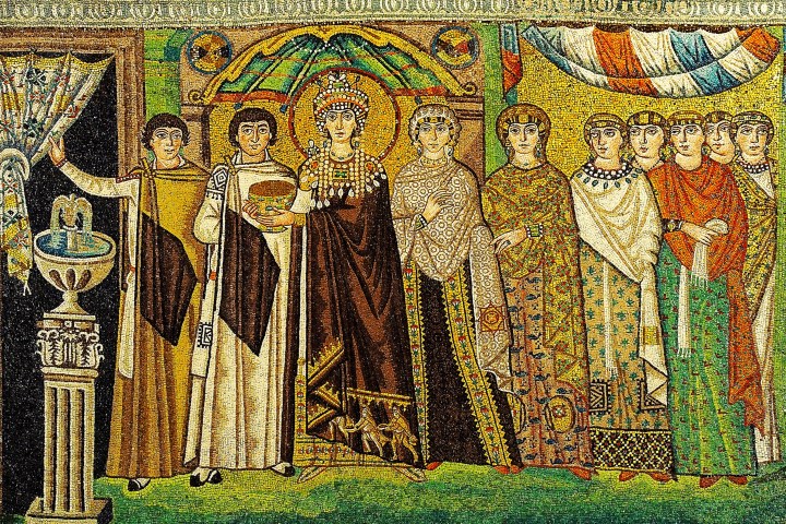 Byzantine mosaic depicting a crowned figure and attendants in ornate garments.